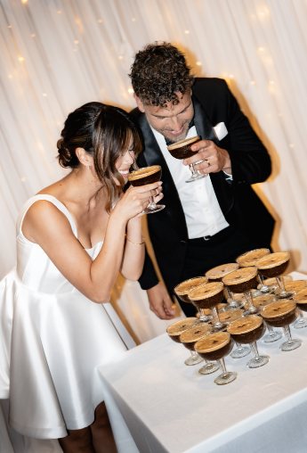 A couple with espresso martinis